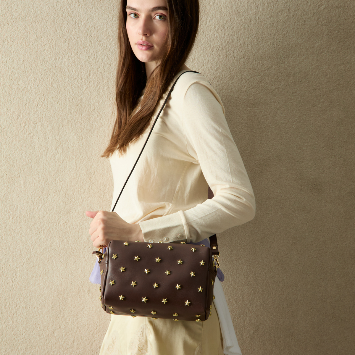 Dixie leather bag with stars in testa brown, by Mercules
