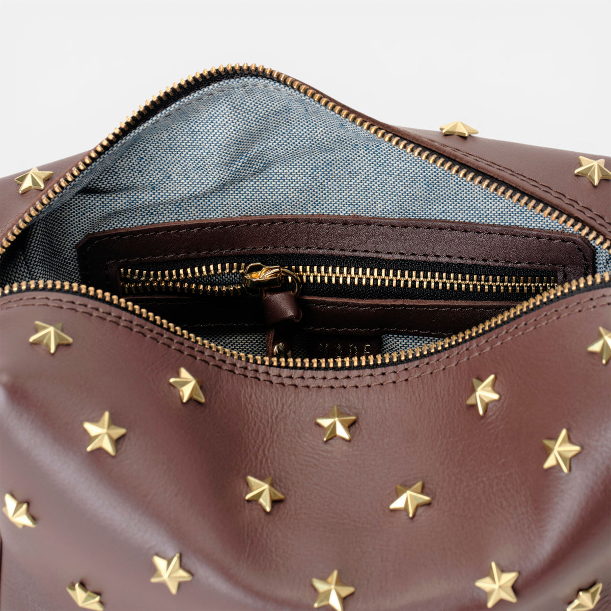 Dixie leather bag with stars in testa brown, by Mercules