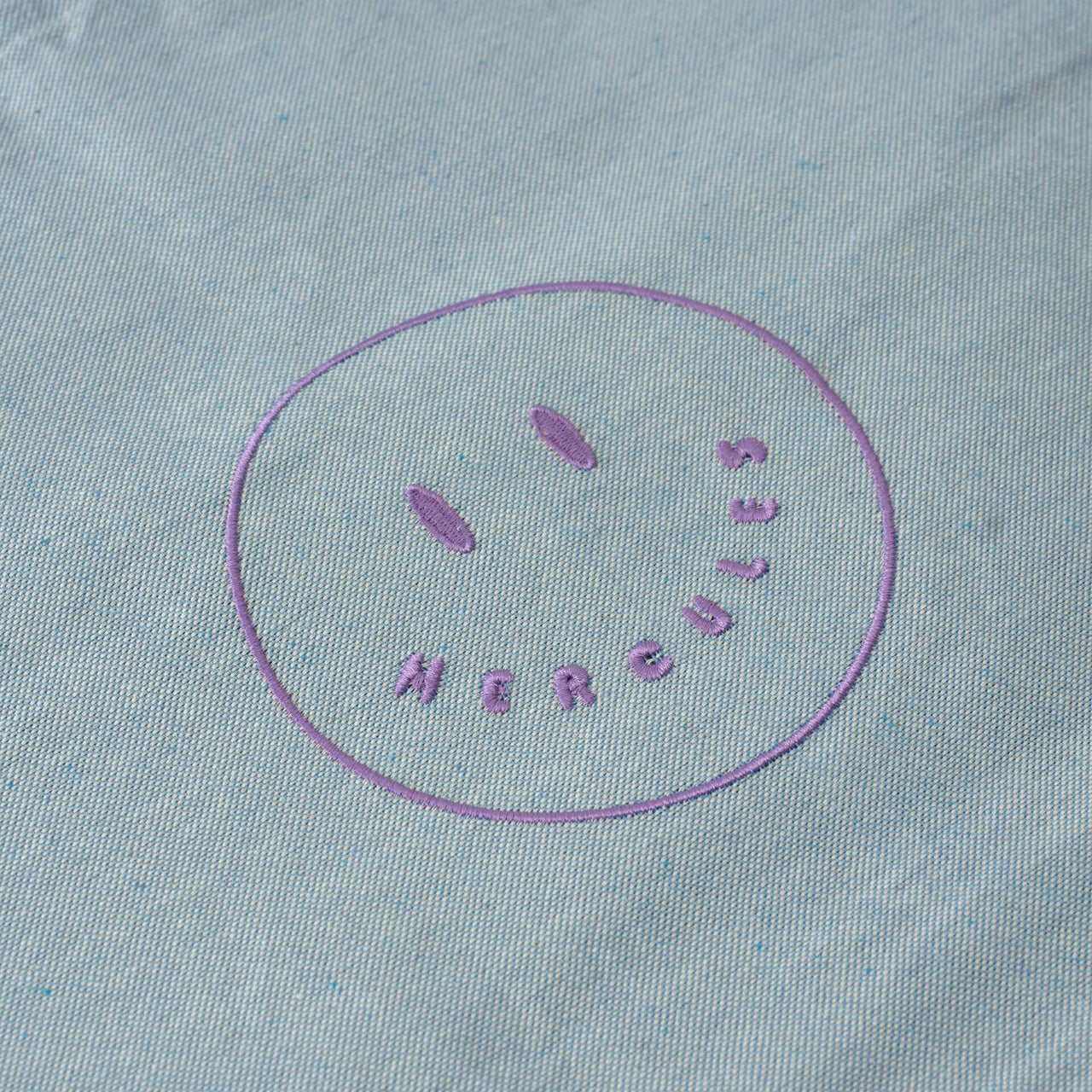 Funda bordada Smiley Celeste