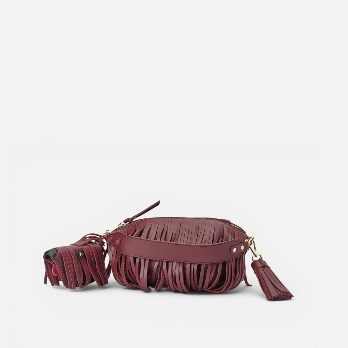 Scott leather bag with fringes in burgundy, by Mercules