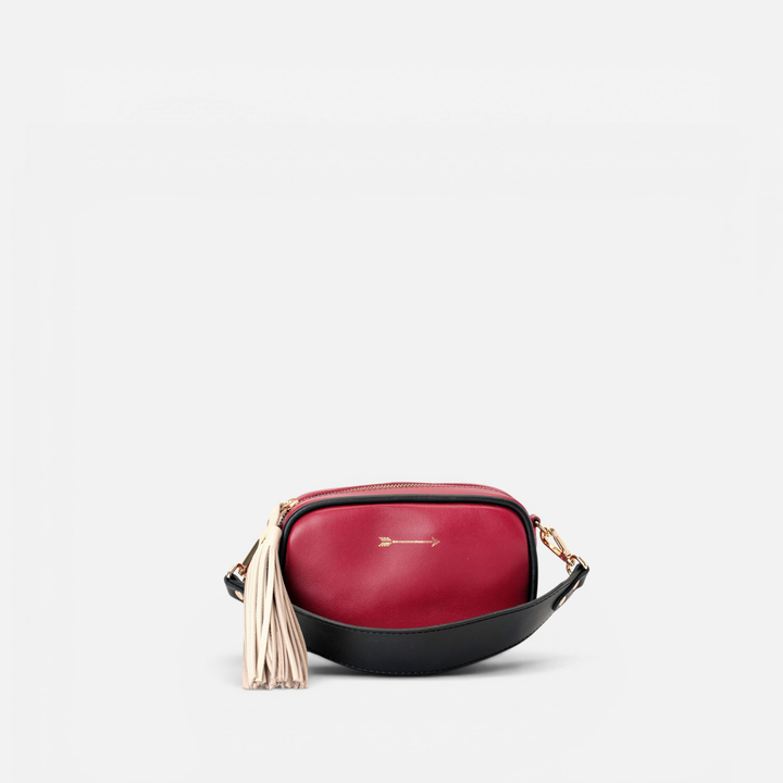 Samba small leather bag with fringes in lipstick red, black and bone, by Mercules