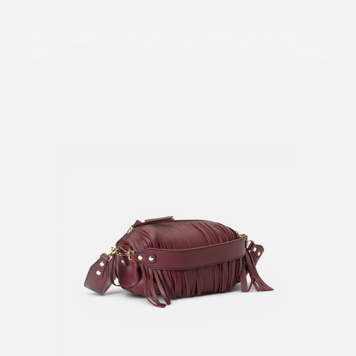 Scott leather bag with fringes in burgundy, by Mercules