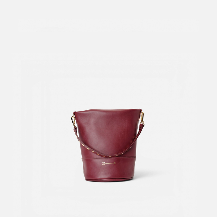 Bolso cubo con tachuelas Perseo color burdeos, de Mercules