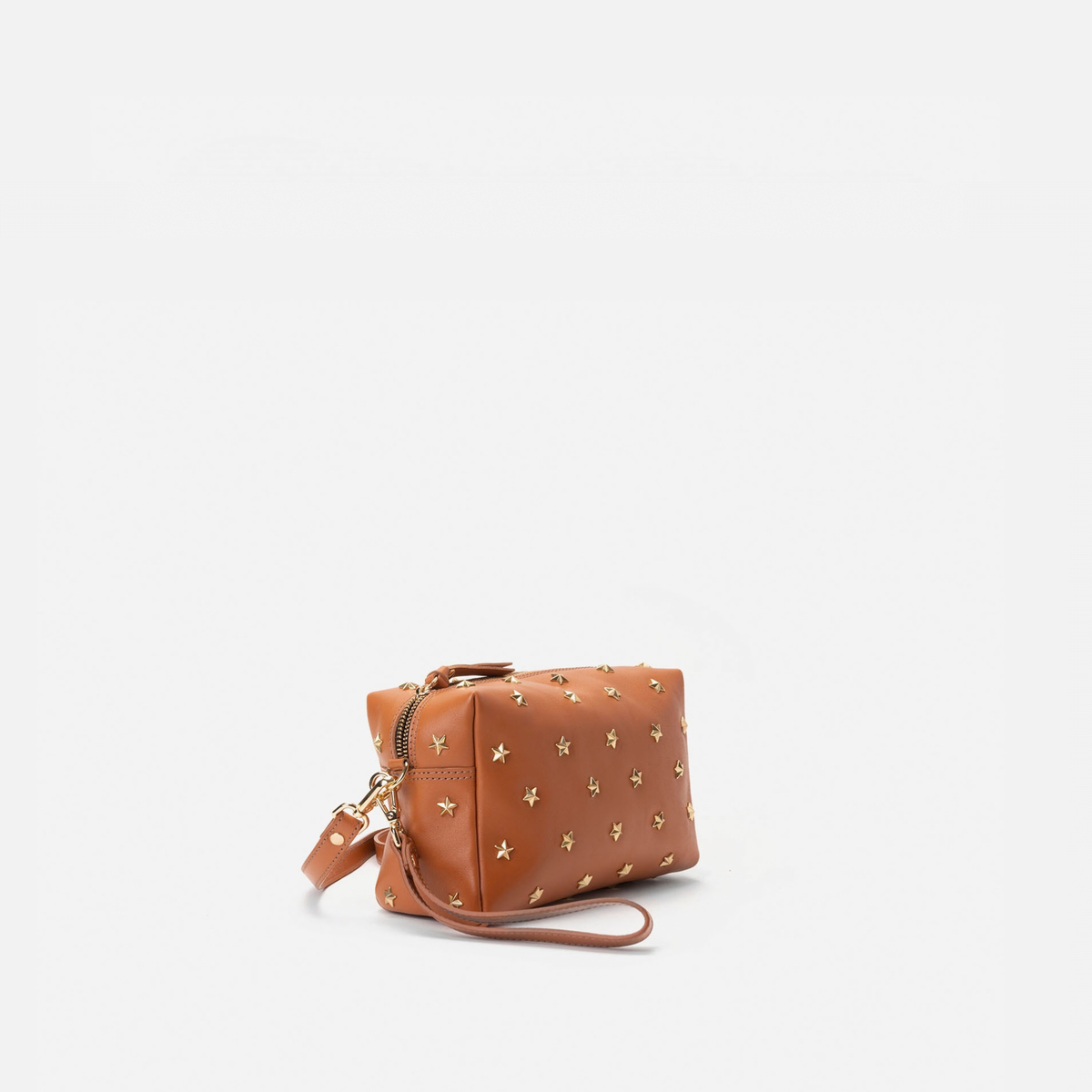 Dixie leather bag with stars in cognac, by Mercules
