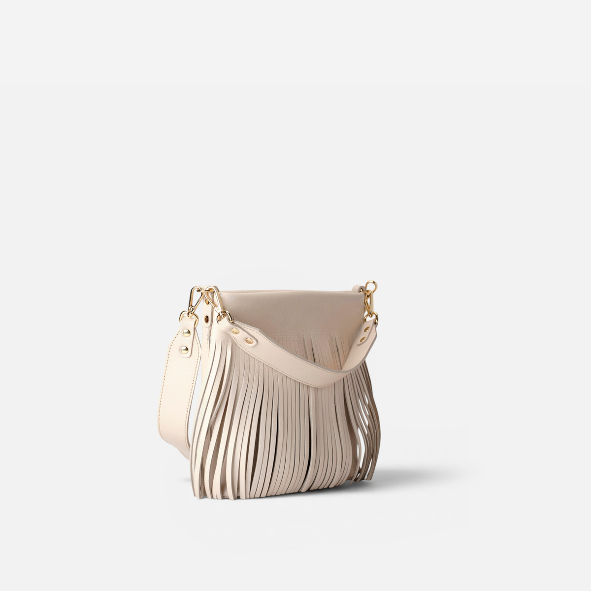 Bolso de piel con flecos Tango flecos color hueso, de Mercules