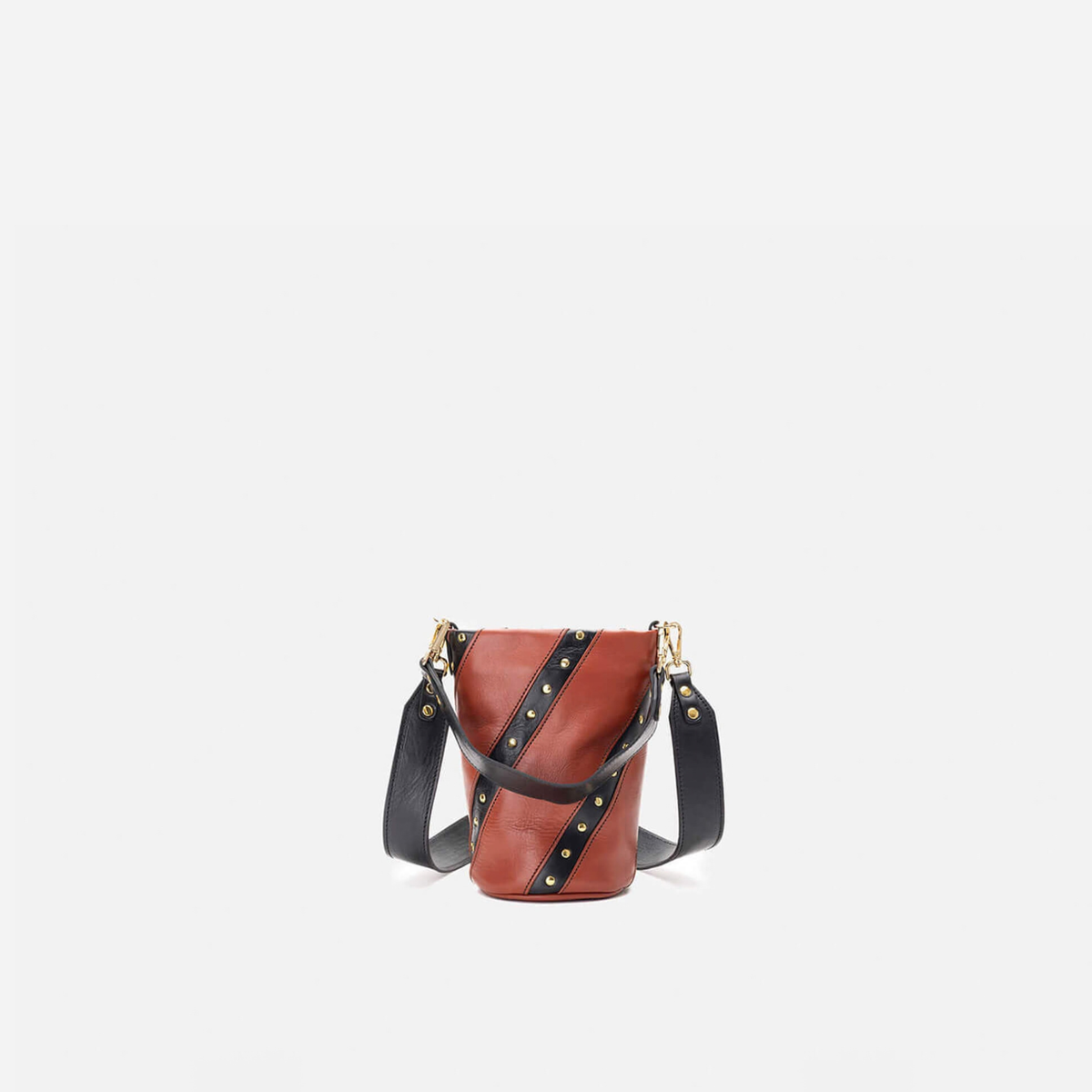 Bolso pequeño con tachuelas Candy Twist color teja y negro, de Mercules