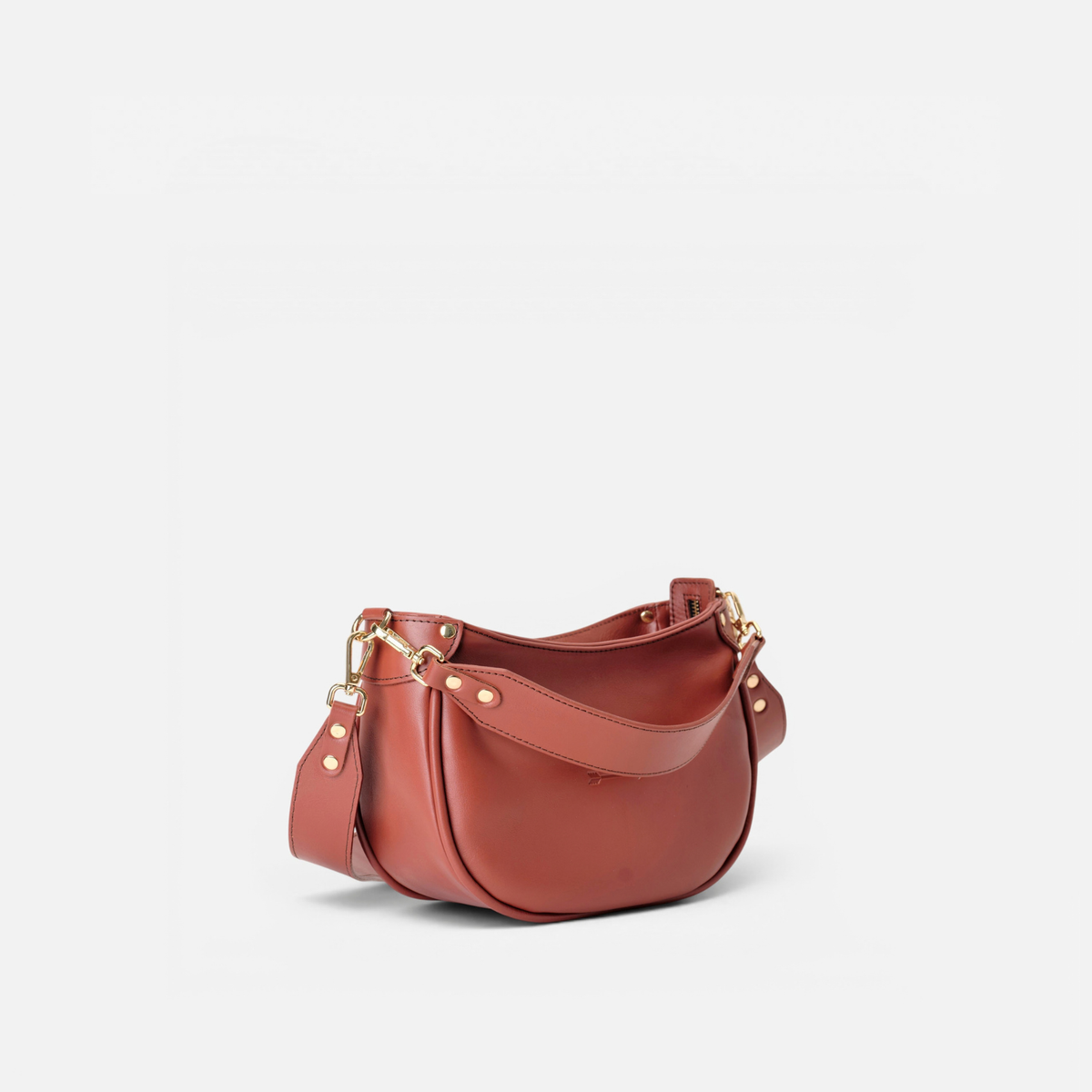 Bolso media luna de piel Coney color teja, de Mercules