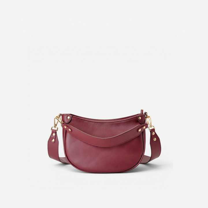 Bolso media luna de piel Coney color burdeos, de Mercules