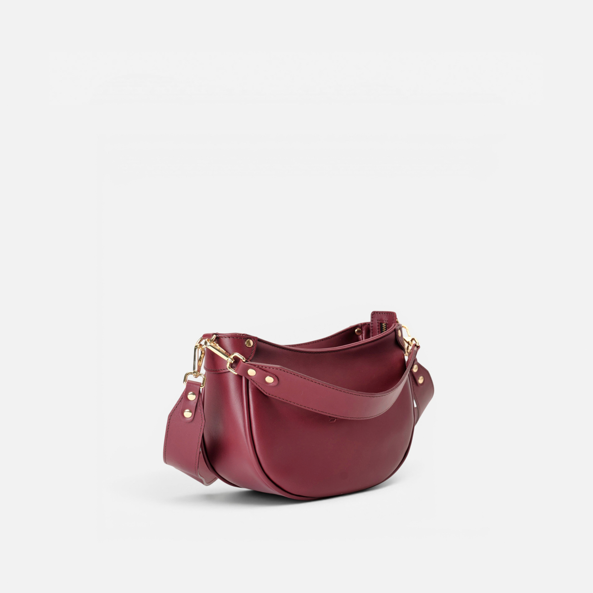 Coney half-moon leather bag in burgundy, by Mercules