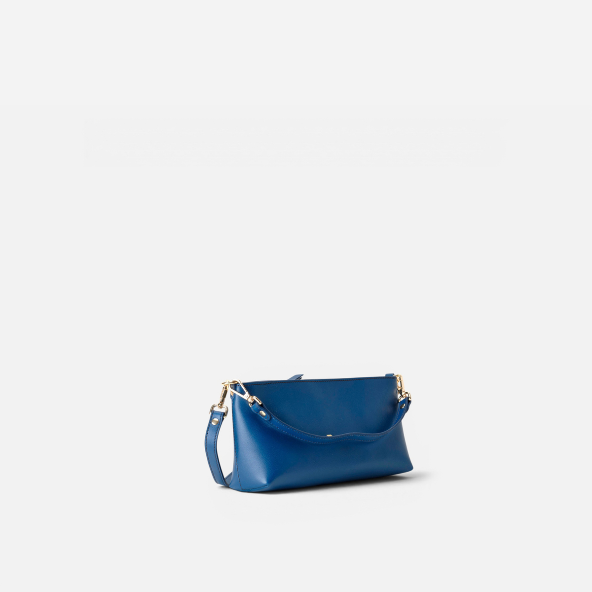 Carri leather baguette bag in navy, by Mercules