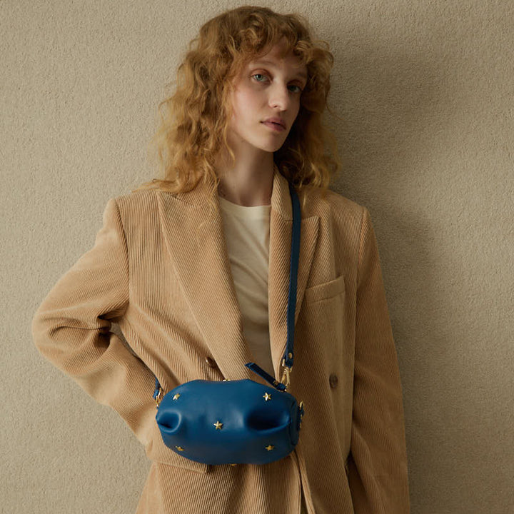 Bolso pequeño con estrellas Wasp color azul marino, de Mercules