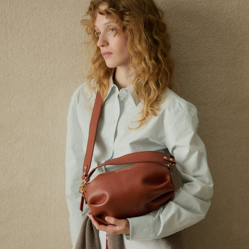 Bolso ovalado de piel Wasp Large color teja, de Mercules