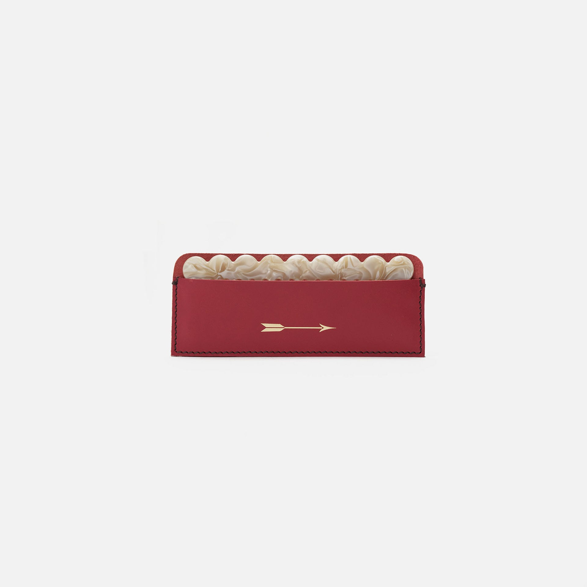 Peine con funda de piel roja